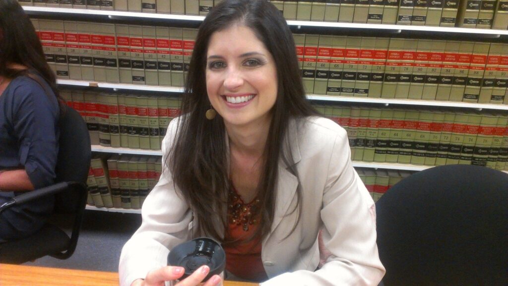 Paralegal Stephanie Leslie in a law library
